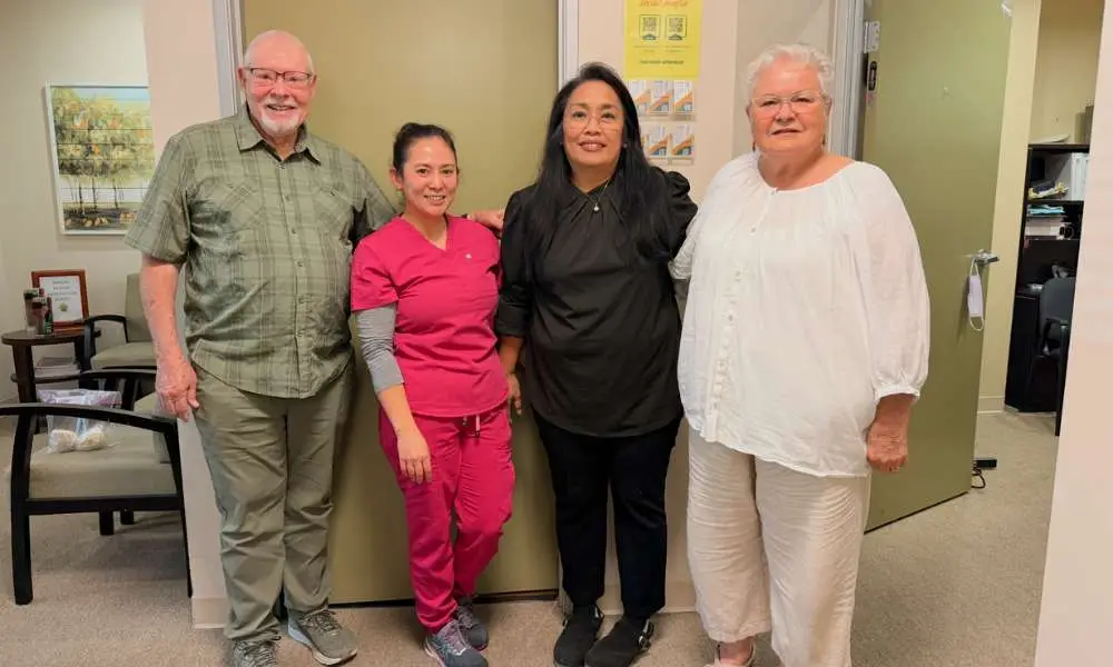 HDT Chula Vista home dialysis patient and caregiver couple with facility manager Necitas and dialysis nurse